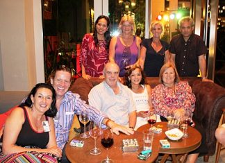 Bea Grunwell (standing 2nd left), president of the Pattaya International Ladies Club (PILC), Jeena Saguansap (standing left), Tea Tree Spa manager, Tracy Cosgrove (seated right) and a group of friends enjoy good fellowship during the Lighthouse Club Charity networking event at Holiday Inn Pattaya recently.